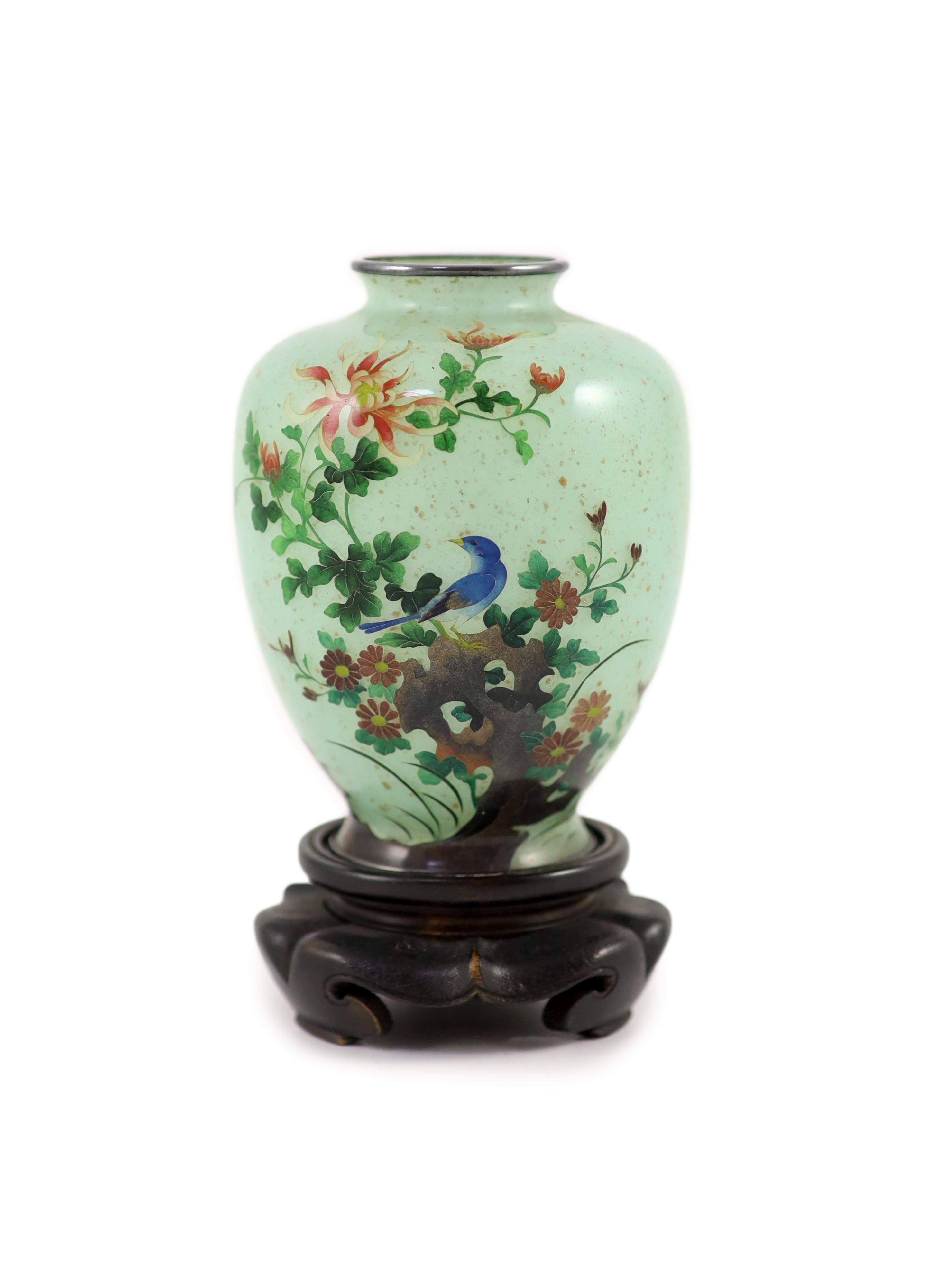 A Japanese plique-à-jour enamel vase, early 20th century, 12 cm high, wood stand, internal hairline cracks